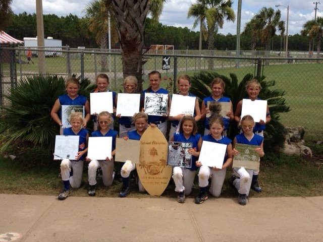 Mojo Cherry 8U team picture after winning USFA world series